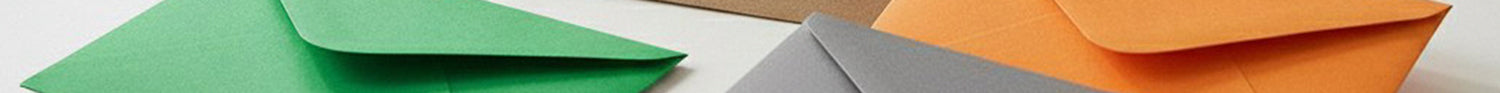 Colorful paper sheets in green, orange, and gray on a white background